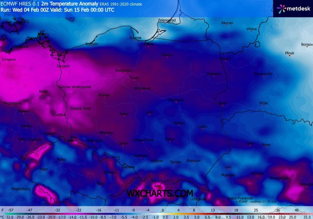 Kolorowa mapa Polski przedstawiająca anomalie temperatury na wysokości 0,1 metra względem średnich wartości z lat 1991–2020, z przewagą intensywnych odcieni niebieskiego i fioletowego sygnalizujących duże odchylenia poniżej normy.