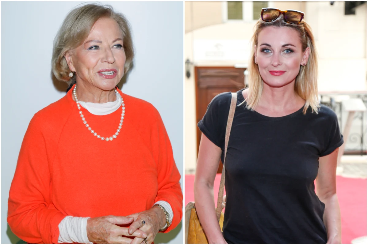 Bożena Dykiel, Ilona Wrońska Dwie kobiety, jedna ubrana w pomarańczowy sweter z perłowym naszyjnikiem, druga w czarną koszulkę z założonymi na głowie okularami przeciwsłonecznymi, stojące w jasnych, niezależnych przestrzeniach.