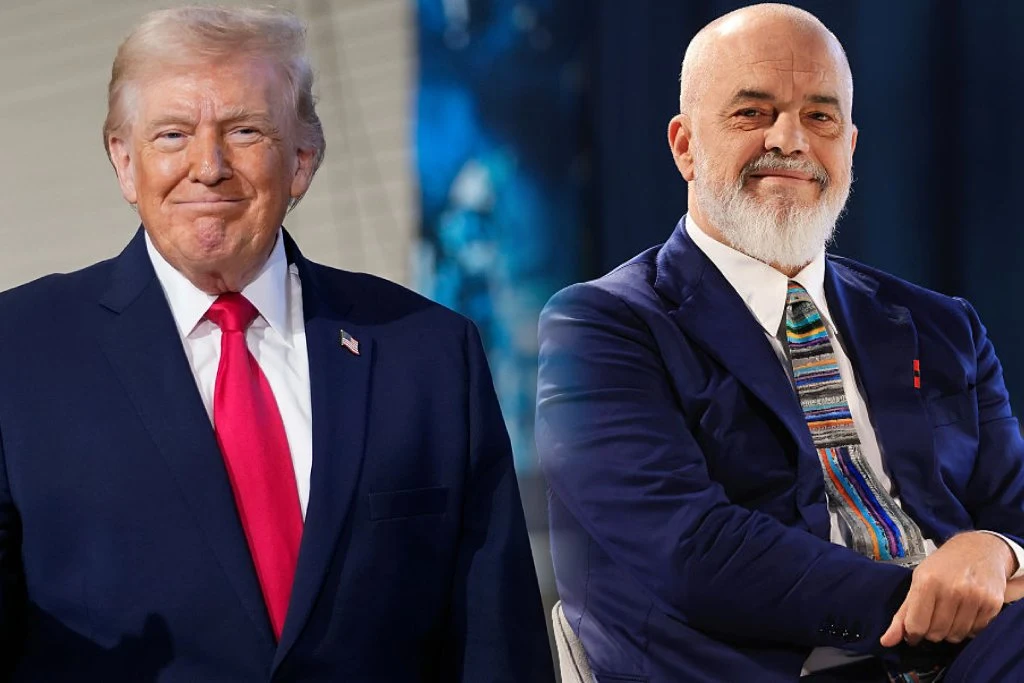 Premier Albanii Edi Rama (z prawej) weźmie udział w inauguracyjnym posiedzeniu Rady Pokoju Donalda Trumpa Dwóch mężczyzn w garniturach, jeden z nich stoi w czerwonym krawacie i granatowej marynarce z lekko uśmiechniętą miną, drugi siedzi z założonymi rękami, uśmiechnięty, z białą brodą oraz w kolorowym krawacie.