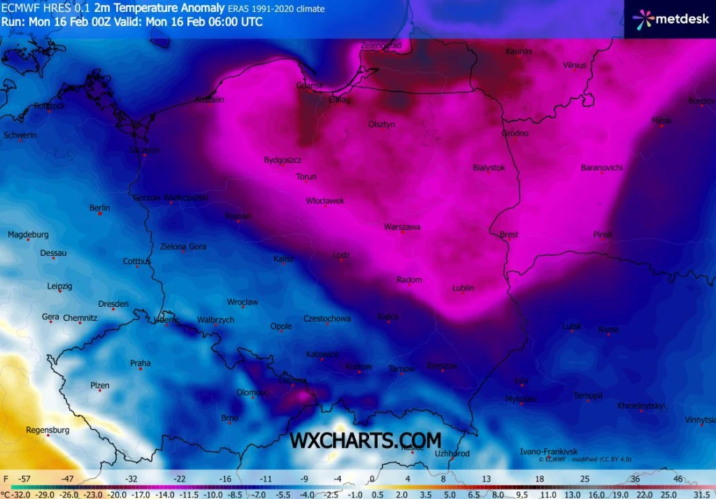 Mapa anomalii temperatury w Polsce i części Europy Środkowej, ukazująca znaczne ochłodzenie i obszary silnych mrozów oznaczone intensywnymi odcieniami fioletu i różu, szczególnie w centralnej i północno-wschodniej Polsce. Na mapie znajdują się nazwy mi...