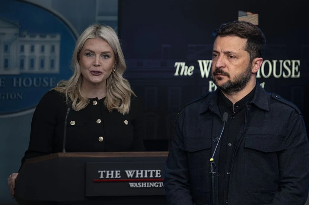 USA - Ukraina. Zełenski rozgoryczony, Biały Dom odpowiada Kobieta w czarnej sukience przemawia przy mównicy z napisem The White House, obok stoi mężczyzna w ciemnej marynarce z mikrofonem przypiętym do kołnierza. W tle wyraźnie widoczny napis The White House oraz zarys budynku prezydenckiego USA.