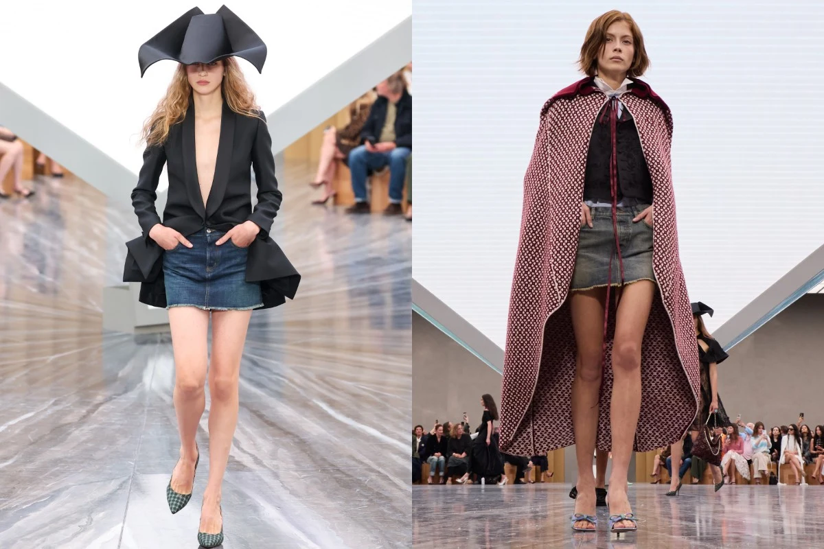 Modelki kroczą po wybiegu ubrane w oryginalne stylizacje: po lewej marynarka z bardzo głębokim dekoltem, krótką spódniczką jeansową oraz fantazyjnym dużym kapeluszem, po prawej ciemna koszula, mini i obszerne poncho z geometrycznym wzorem.