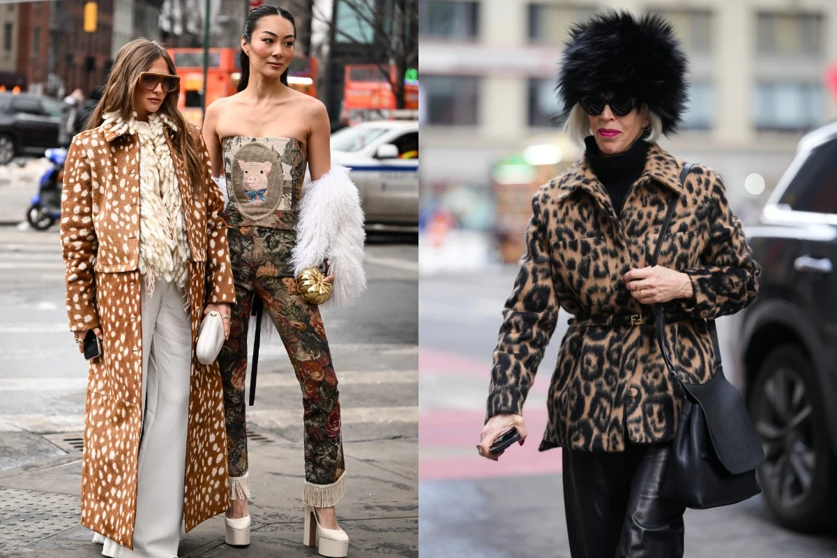 Kobiety w eleganckich stylizacjach inspirowanych zwierzęcymi wzorami, stojące na ulicy miasta. Jedna z nich ubrana w długi płaszcz przypominający skórę jelenia, inna w wyszukany kombinezon i białe futro, a trzecia kobieta w kurtce w panterkę oraz czarn...