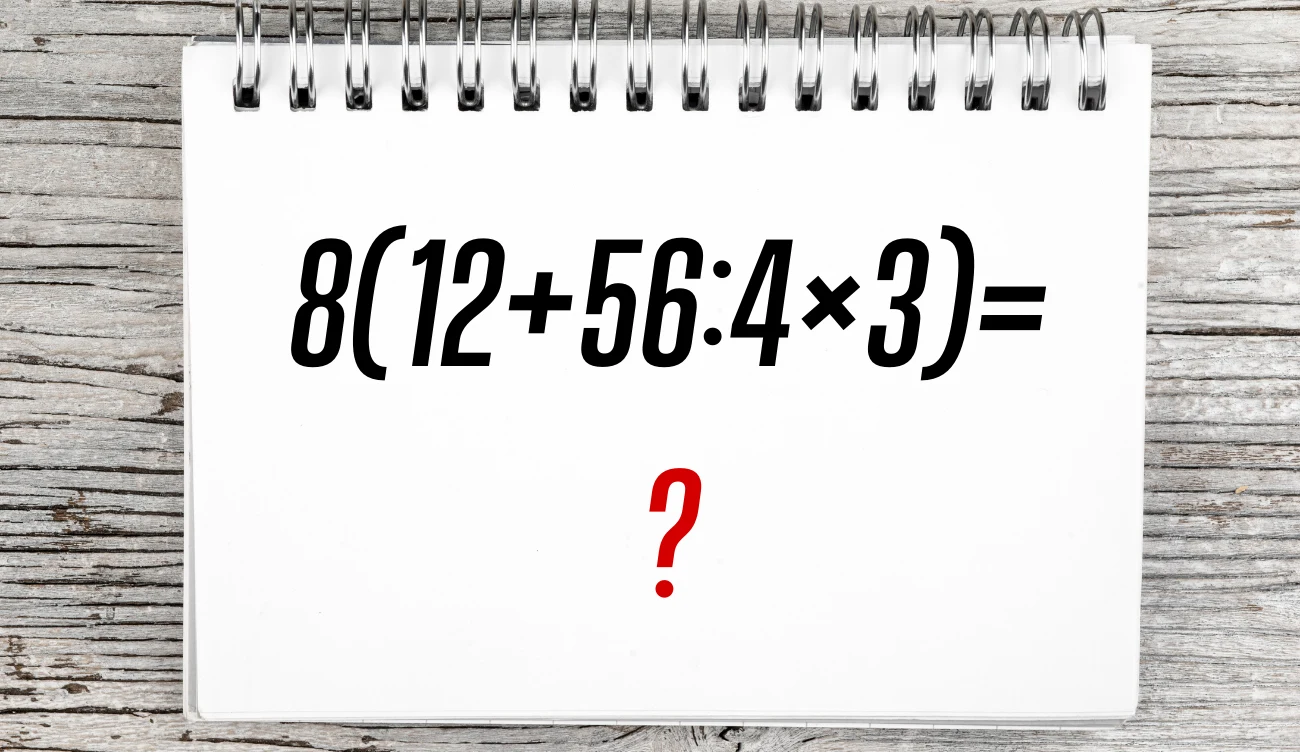 Ta zagadka wcale nie jest prosta. Prawidłowy wynik wymaga koncentracji. Czarna tabliczka umieszczona na drewnianym tle, na której widnieje zapis matematyczny 8(12+56:4×3)= z dużym, czerwonym znakiem zapytania poniżej.