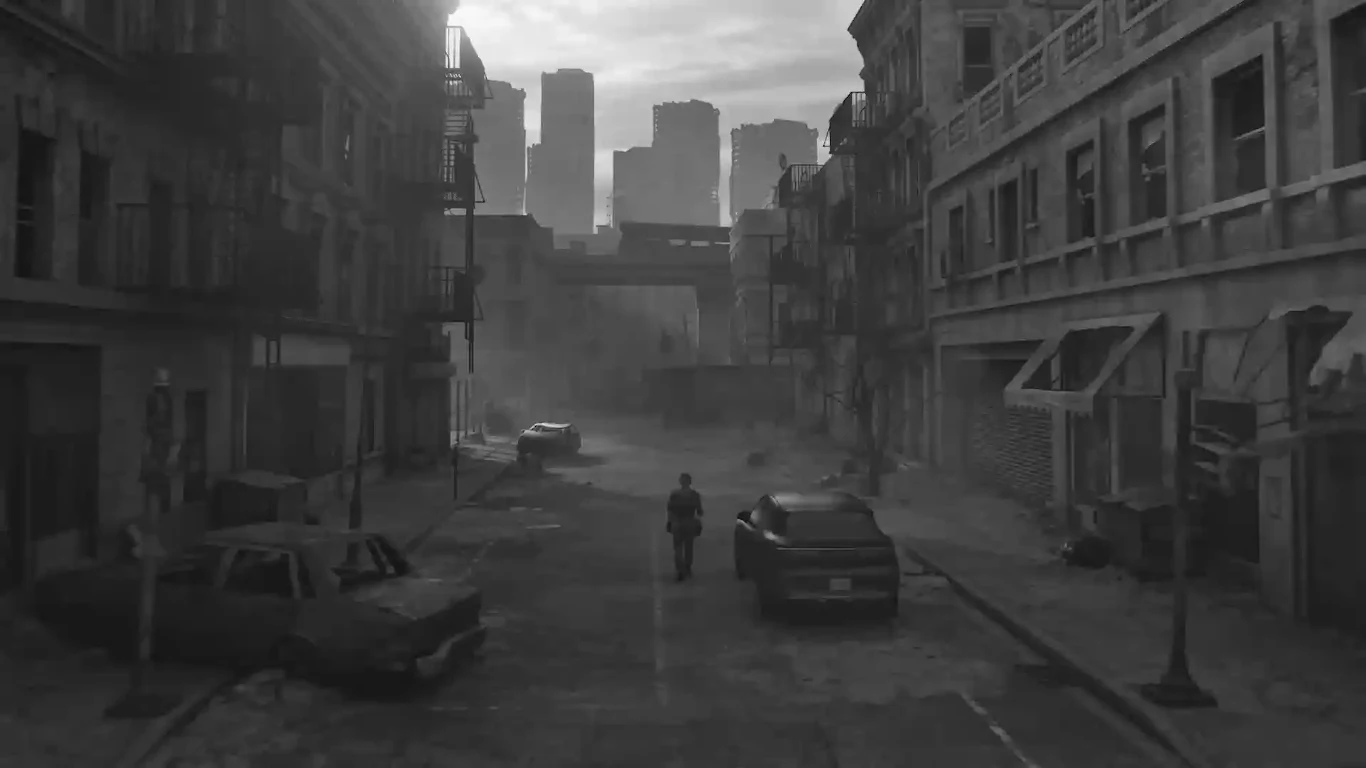 Opuszczona ulica w zniszczonym mieście, samotna osoba idąca środkiem drogi, porzucone i rozbite samochody, zrujnowane budynki po obu stronach oraz zamglone, odległe wieżowce na horyzoncie pod pochmurnym niebem.