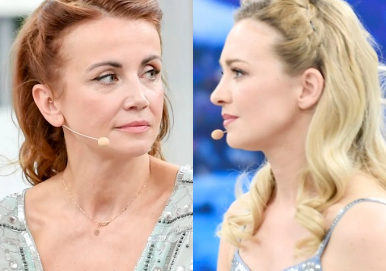 Katarzyna Zielińska, Barbara Kurdej-Szatan Dwie kobiety siedzące obok siebie, obie noszące mikrofony przy twarzy i ubrane w eleganckie stroje, jedna patrzy w stronę drugiej, na tle jasnego wnętrza.