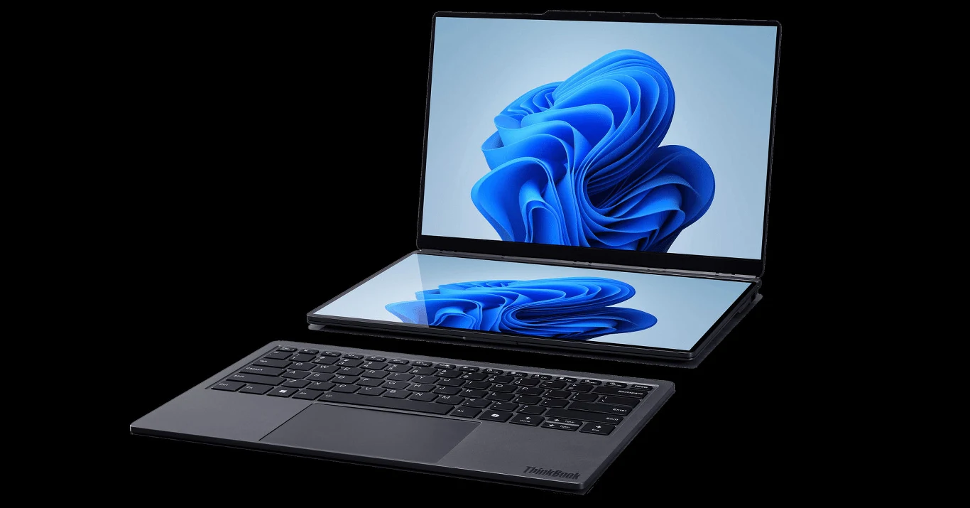 ThinkBook Modular AI PC Concept. Futurystyczny laptop Lenovo na MWC 2026. Nowoczesny laptop z odłączaną klawiaturą i podwójnym ekranem dotykowym, na którym wyświetlany jest system operacyjny Windows o charakterystycznym niebieskim motywie graficznym.