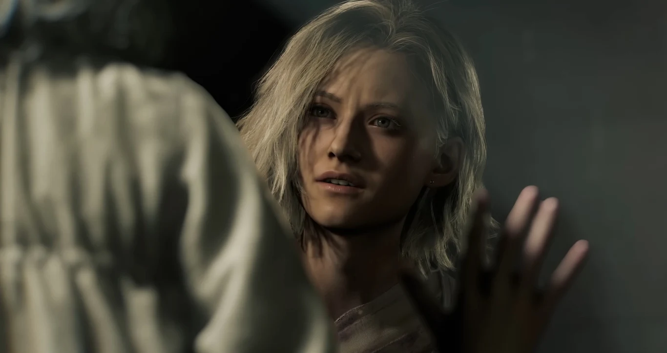 Kadr z Resident Evil Requiem: kobieta o jasnych włosach unosi dłoń, naprzeciwko stoi druga postać.