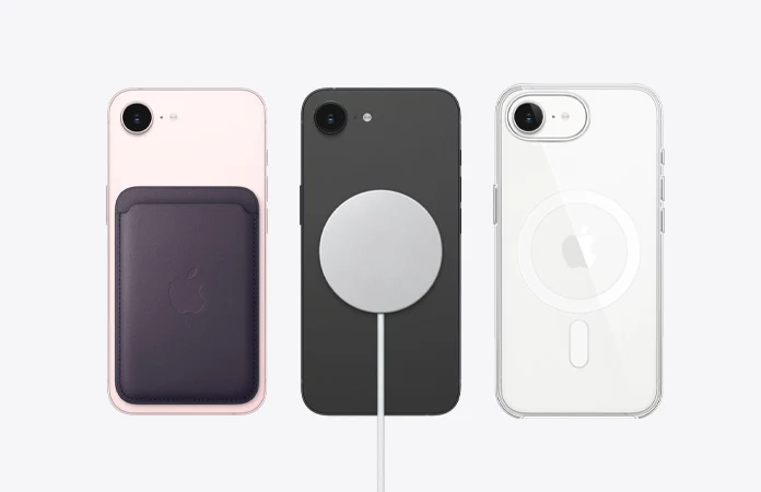 iPhone 17e oferuje wsparcie dla MagSafe. Trzy smartfony ustawione pionowo tyłem, po lewej różowy z dołączonym skórzanym portfelem, po środku czarny podłączony do magnetycznej ładowarki, po prawej biały w przezroczystym etui z widocznym okręgiem wokół cewek do ładowania indukcyjnego.