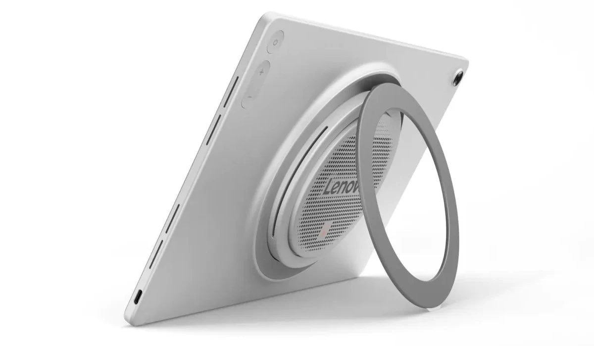 Lenovo Tab Plus Gen 2 w kolorze srebrnym z dużym okrągłym głośnikiem JBL i rozkładaną podstawką.