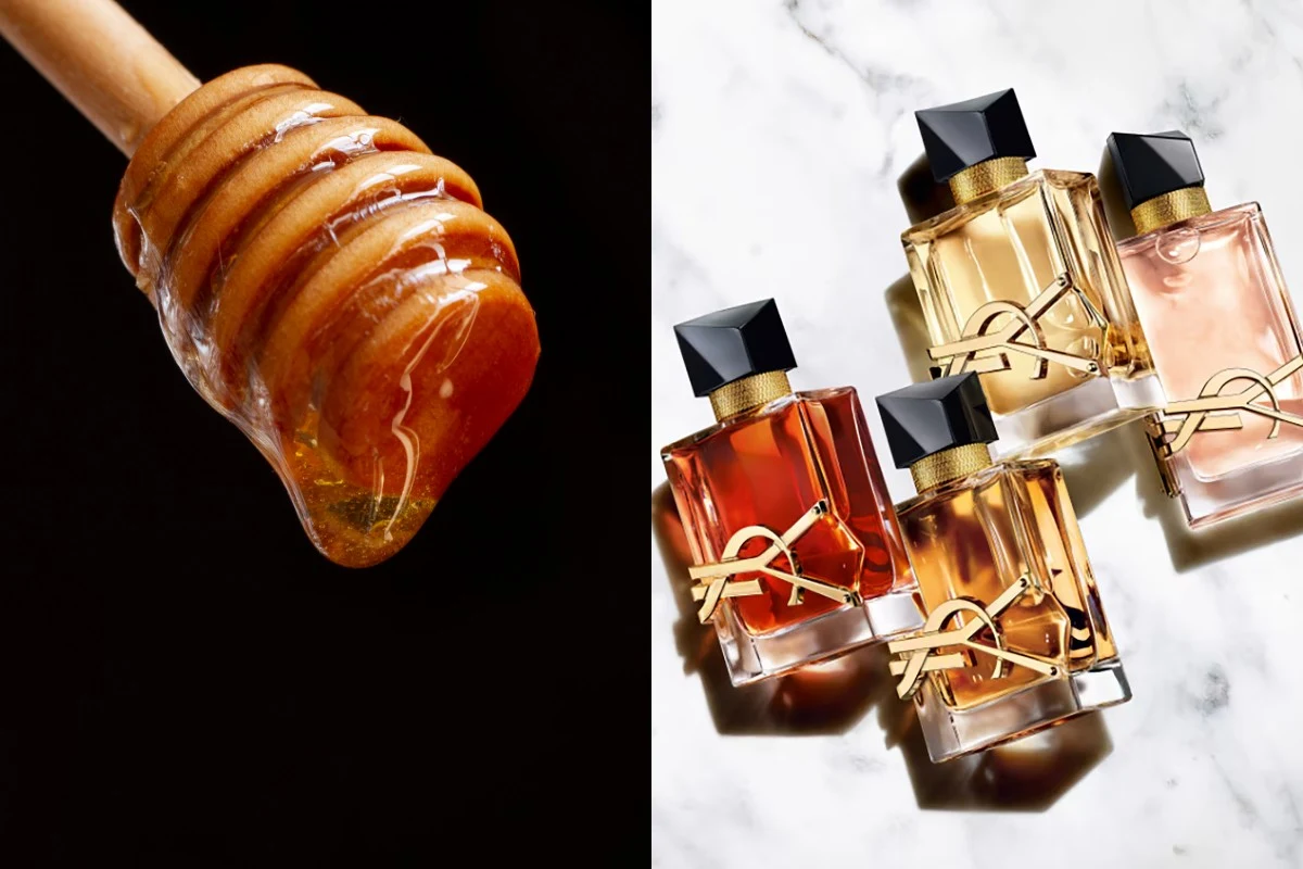 Zbliżenie na nabierak do miodu pokryty gęstym, lejącym się miodem oraz cztery eleganckie flakony perfum z czarnymi nakrętkami i charakterystycznym, złotym motywem, ustawione na jasnym marmurowym tle.