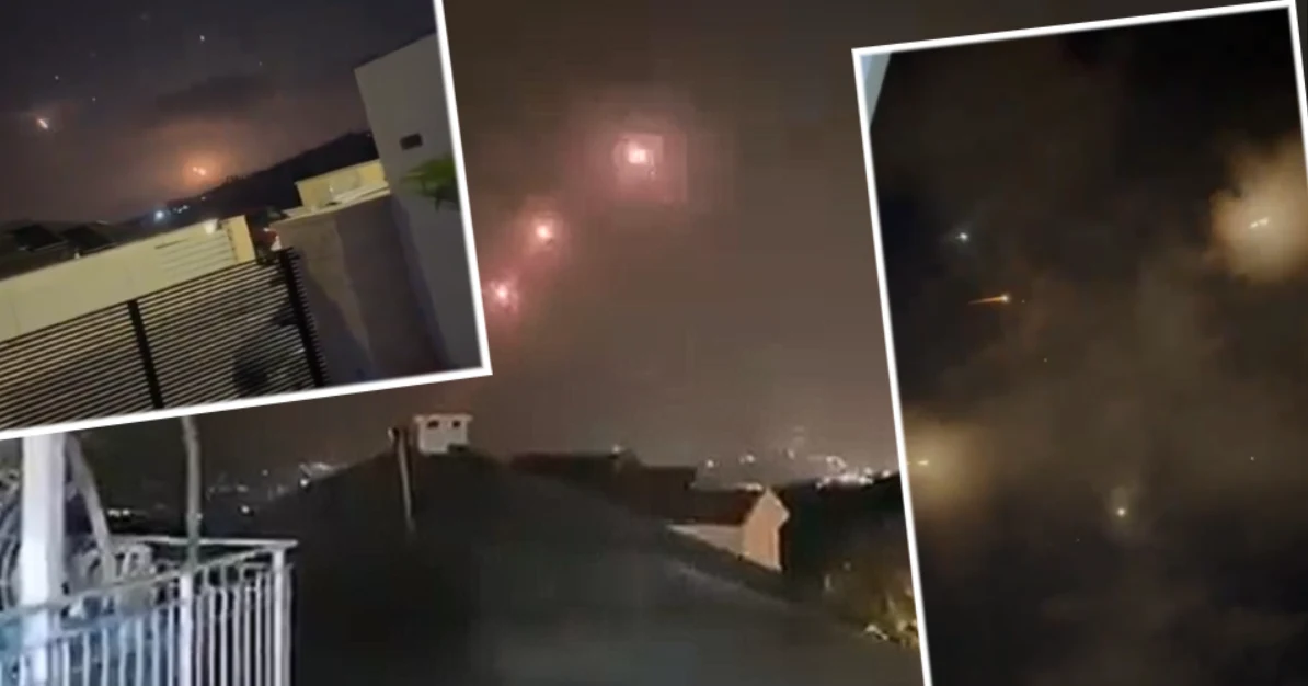 Nocne niebo nad Izraelem rozświetlone eksplozjami i smugami światła podczas ataku rakietowego Hezbollahu.