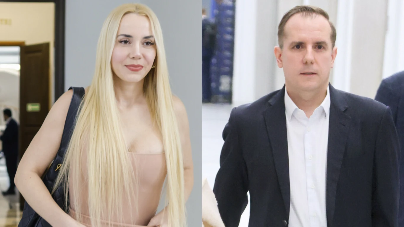 Kobieta z długimi blond włosami w beżowej sukience z torbą na ramieniu oraz mężczyzna w ciemnej marynarce i białej koszuli, obydwoje znajdują się w jasnych, nowoczesnych wnętrzach.