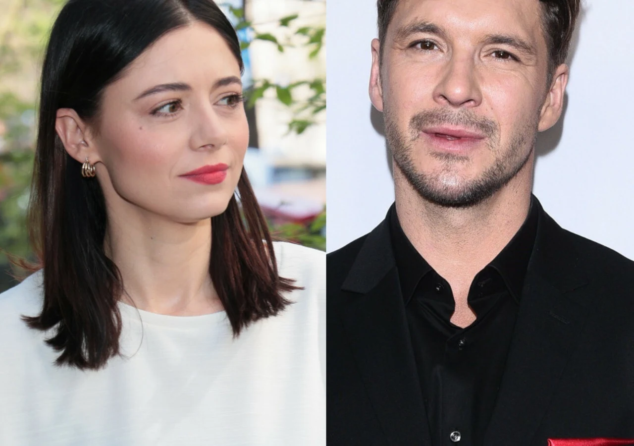 Adriana Kalska, Mikołaj Roznerski Adriana Kalska w białej bluzce i Mikołaj Roznerski w czarnym garniturze.