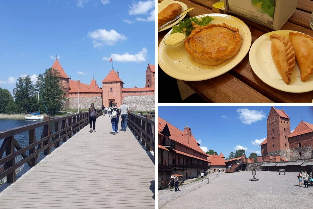 Ceglany zamek z czerwonymi dachami otoczony wodą i mostem drewnianym, osoby spacerujące wokół warowni, tradycyjne potrawy serwowane na talerzach, przestronny dziedziniec zamkowy pod błękitnym niebem.