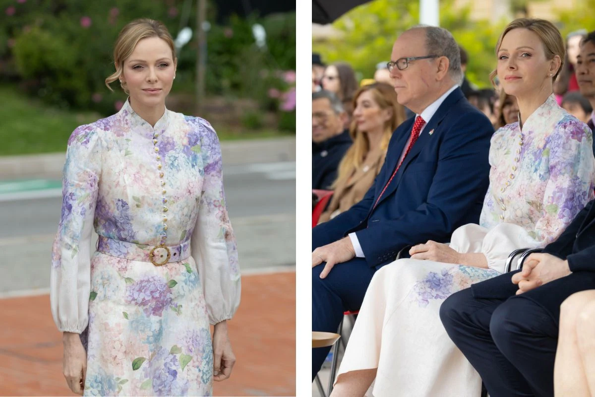 Kobieta ubrana w elegancką sukienkę w kwiatowy wzór stoi na zewnątrz oraz siedzi wśród innych ludzi podczas oficjalnego wydarzenia, obok mężczyzny w garniturze z czerwoną krawatą.