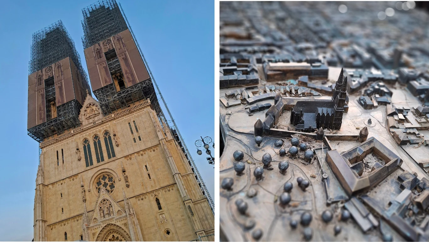 Katedra z dwoma wieżami pokrytymi rusztowaniami i osłonami podczas renowacji oraz szczegółowy model miasta z zaznaczonymi budynkami i drzewami.