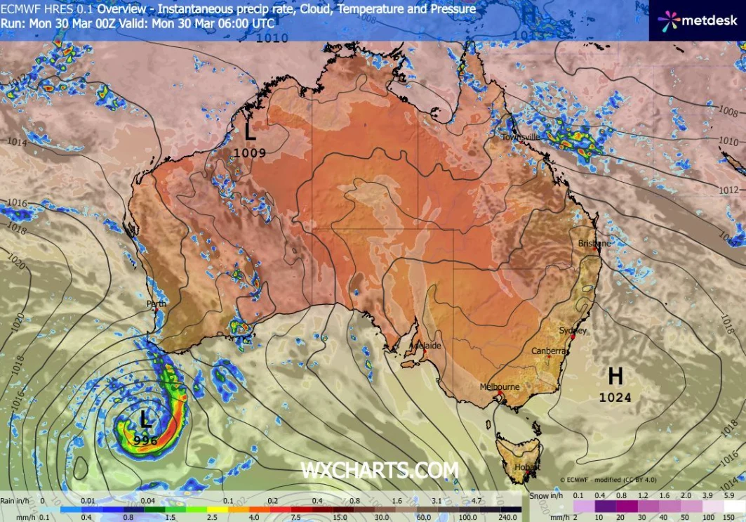 Mapa pogodowa Australii z układem niskiego ciśnienia na zachodzie oraz wysokiego ciśnienia na południowym wschodzie, intensywnymi opadami i silnym wiatrem w okolicach Perth, a także wysokimi temperaturami w centralnej i północnej części kontynentu.