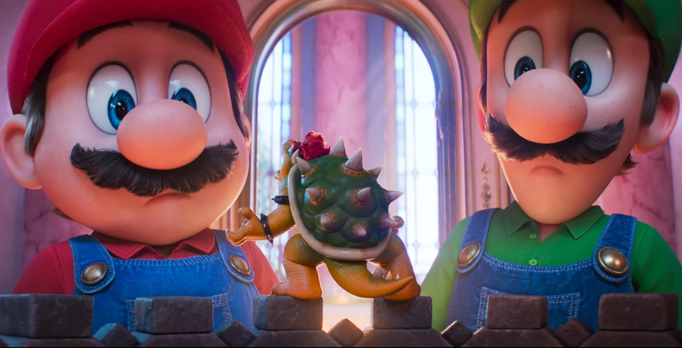 Kadr z filmu "Super Mario Galaxy Film": dwie postacie w czapkach i ogrodniczkach obok stwora z kolczastym pancerzem.