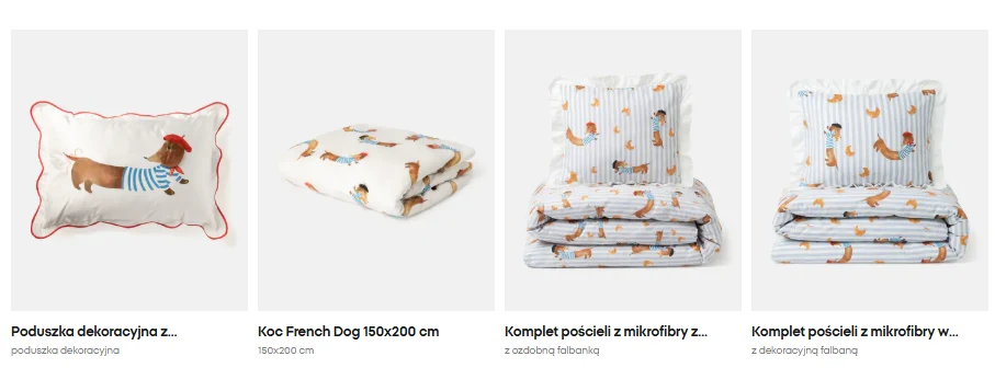 komplet jasnej pościeli, koc i poduszka dekoracyjna, wszystkie ozdobione motywem jamnika w różnych pozach oraz paskami, utrzymane w przyjaznych, stonowanych kolorach