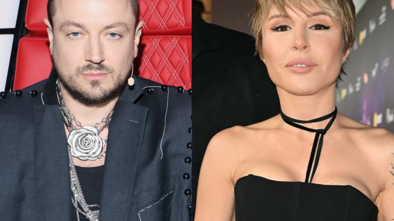 Aleksander-Milviv Baron i Blanka Lipińska. Aleksander Baron i Blanka Lipińska elegancko ubrani, pozują na zdjęciu, patrząc w obiektyw.