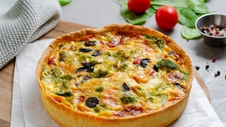 Quiche with Vegetables, Homemade Open Pie, Savory Tart on Bright Background