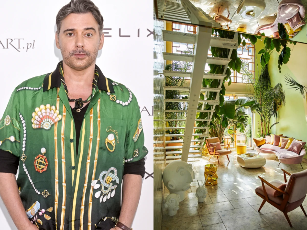 Mężczyzna z lekko siwiejącymi włosami i krótką brodą ubrany w zieloną koszulę z kolorowymi wzorami stoi na tle białej ścianki z napisem, obok nowoczesny, jasny salon z dużymi oknami, żółtymi ścianami, bujną roślinnością i różowymi meblami wypoczynkowymi.