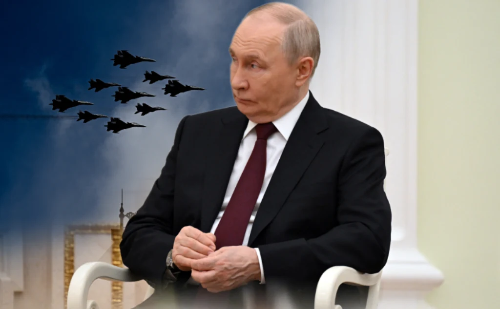 Duma Państwowa przyjęła w pierwszym czytaniu ustawę o wykorzystaniu wojsk za granicą Władimir Putin, w tle po lewej lecący w formacji myśliwce na ciemnym niebie