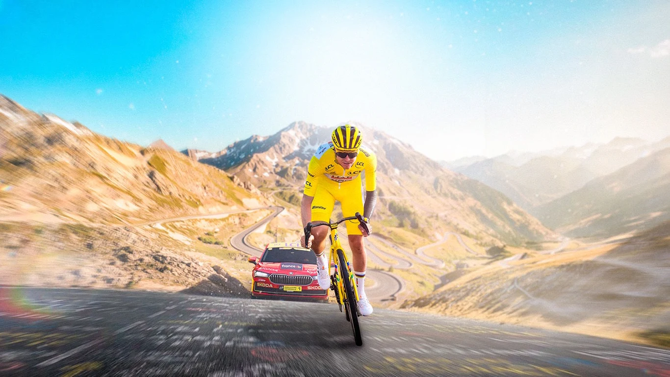 Tour de France 2026 Tour de France 2026. kolarz w żółtym stroju jedzie pod górę szosą, w tle czerwony samochód i góry.