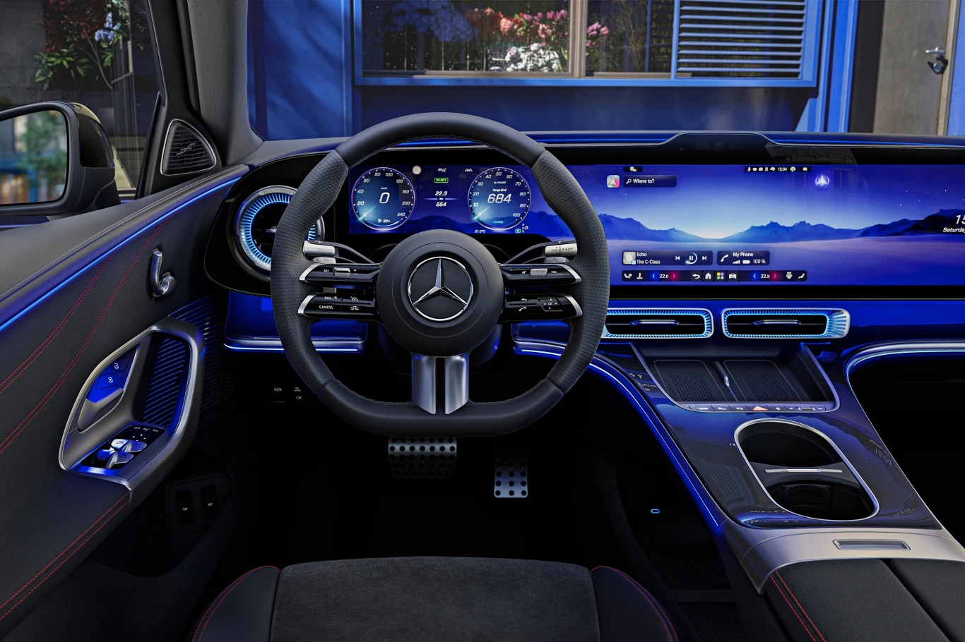 Mercedes klasy C Electric luksusowe wnętrze samochodu marki Mercedes z nowoczesnym kokpitem, wielofunkcyjną kierownicą, panoramicznym ekranem obejmującym cyfrowe zegary oraz system multimedialny, podświetlenia LED nadają futurystyczny charakter