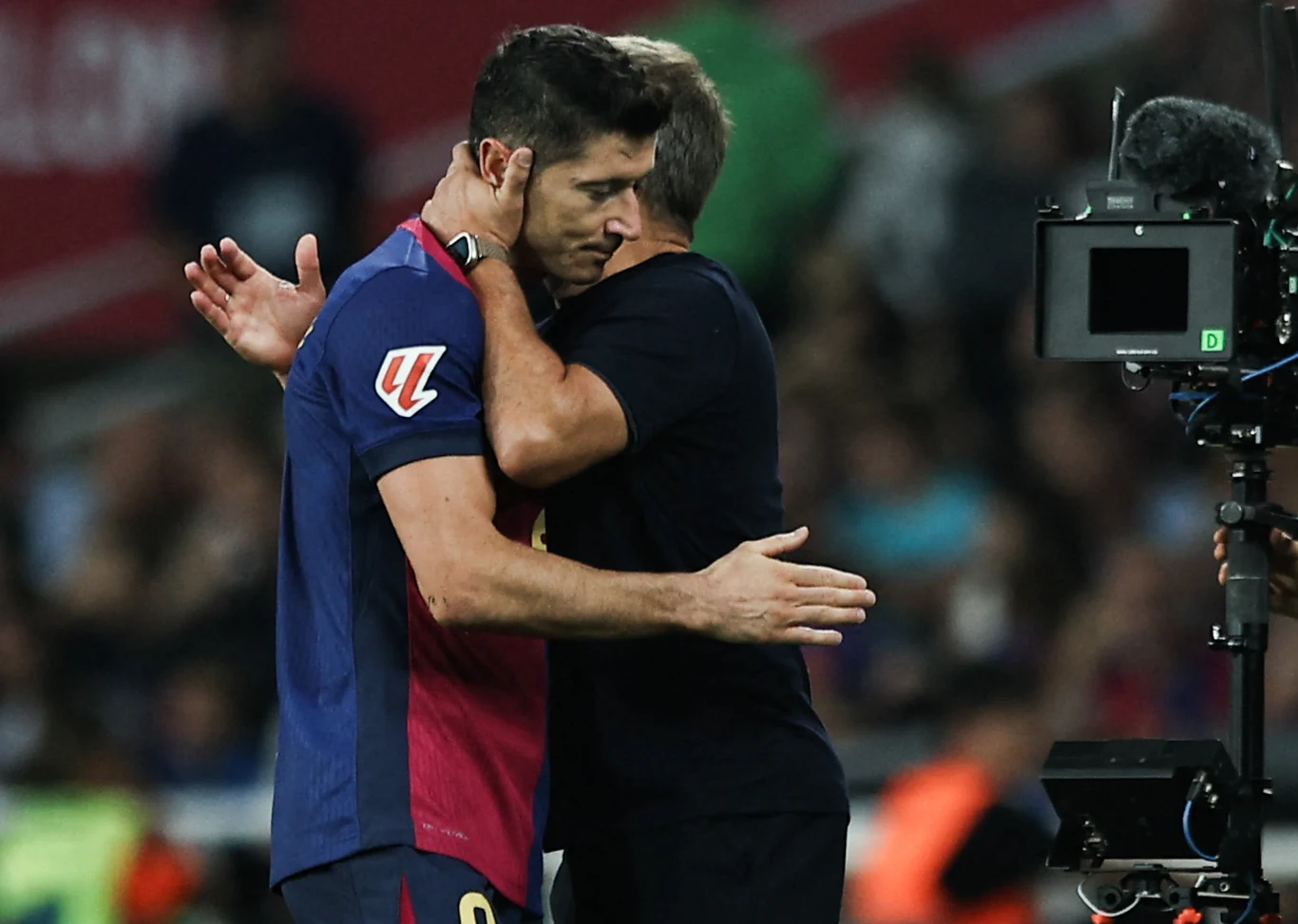 Na zdjęciu Robert Lewandowski i Hansi Flick article cover