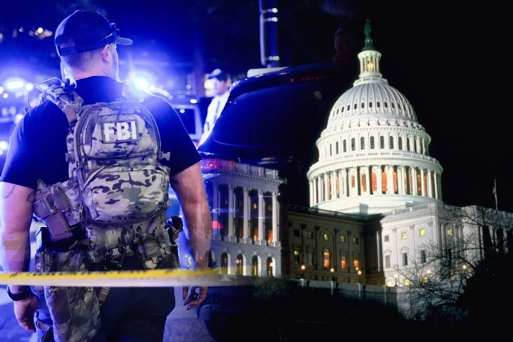 USA. Seria śmierci i zaginięć naukowców. FBI wszczęło śledztwo Agent FBI. Obok budynek Kapitolu w USA