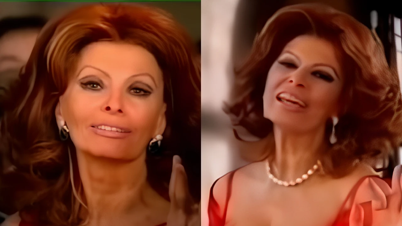 Sophia Loren w reklamie polskiego makaronu Kobieta z burzą rudych włosów, mocnym makijażem oczu oraz eleganckimi ozdobami – kolczykami i naszyjnikiem z pereł, ubrana w czerwono-pomarańczową suknię na ramiączkach; wyraz twarzy sugeruje serdeczność i otwartość.