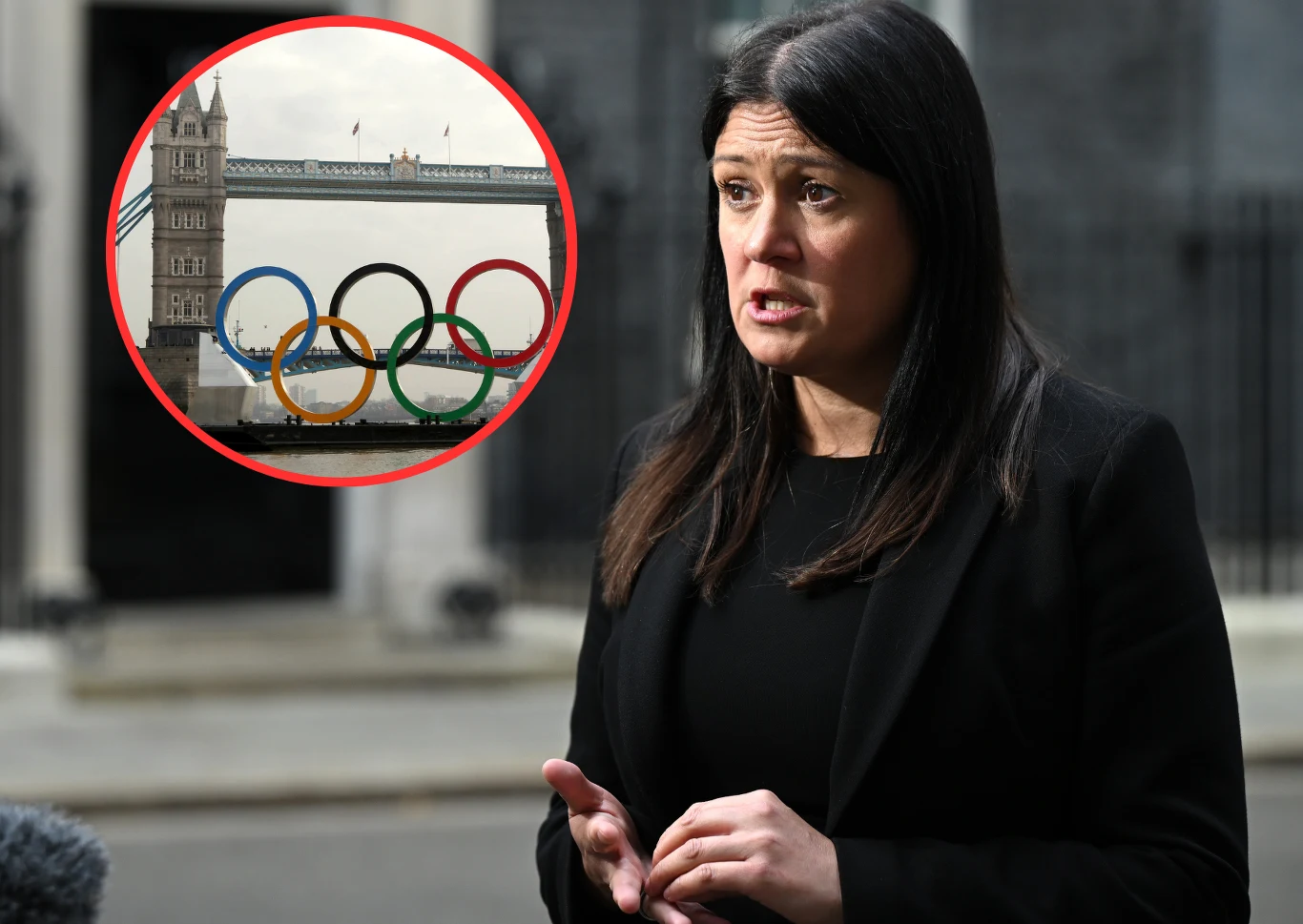 Lisa Nandy, sekretarz stanu w Departamencie Kultury, Mediów i Sportu Lisa Nandy na tle miejskiej zabudowy; widoczne olimpijskie pierścienie i znany most w tle.