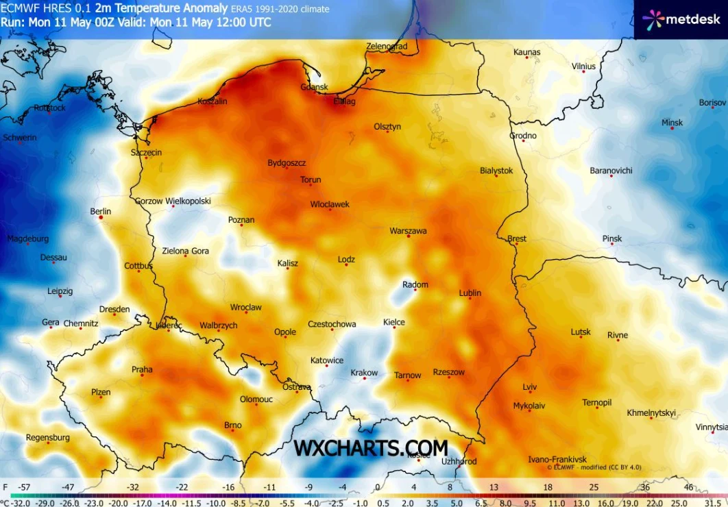 Mapa Polski prezentująca anomalię temperatury powietrza na wysokości 2 metrów, z wyraźnymi strefami dodatnich odchyleń termicznych w centralnej i północno-wschodniej części kraju – najbardziej intensywne kolory wskazują na największe ocieplenie względe...