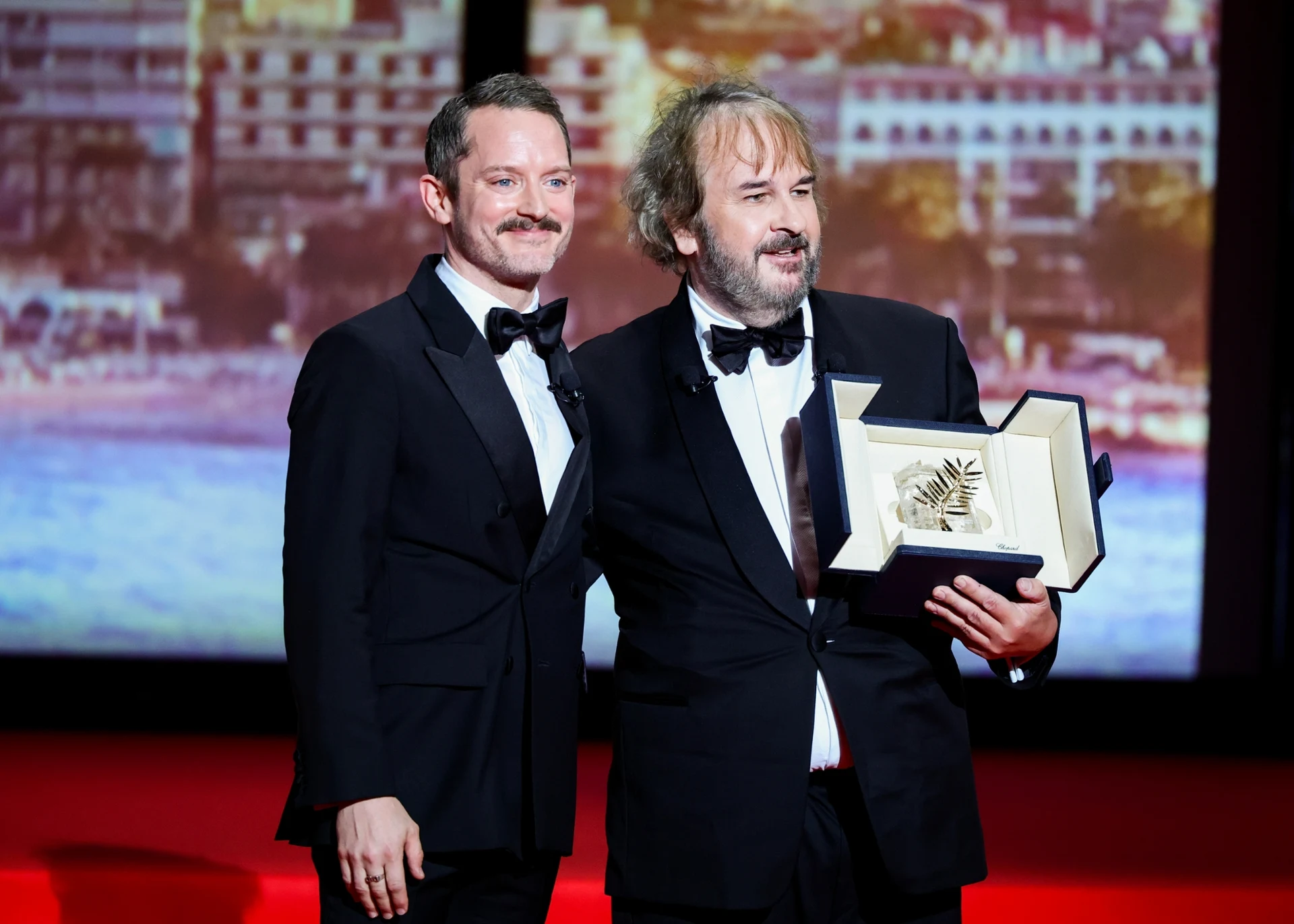Elijah Wood i Peter Jackson podczas ceremonii otwarcia 79. MFF w Cannes