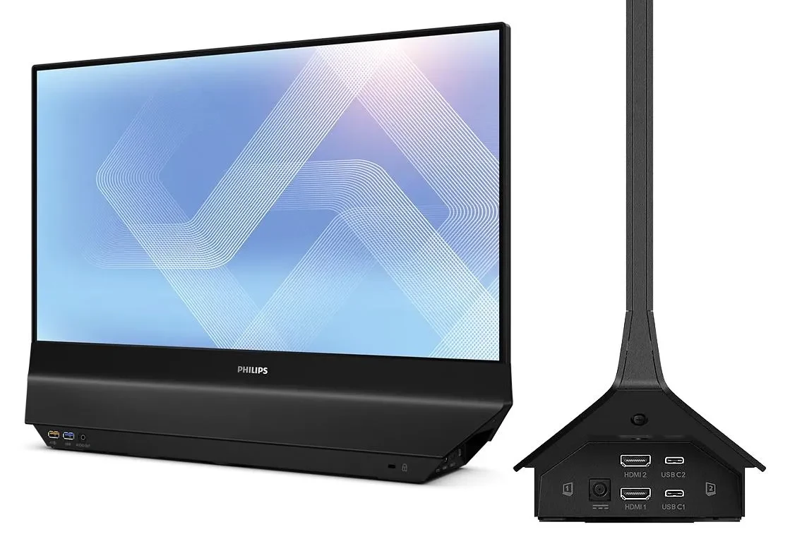 Monitor marki Philips z szerokim ekranem i wąskimi ramkami, umieszczony na masywnej podstawie, obok widoczne są porty HDMI, USB oraz gniazdo zasilania z tyłu podstawy.