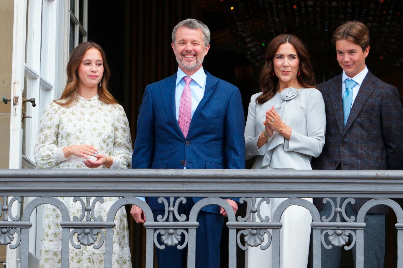 King Frederik X of Denmark (2nd L) and Queen Mary of Denmark (2nd R) stand next to their children Princess Josephine (L), and Prince Vincent as they wave from the balcony at Frederik VIII's Palace on the occasion of the king's 58th birthday, Amalienborg 