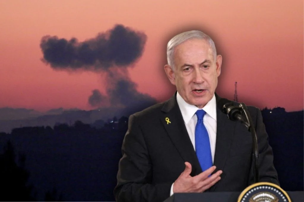 Izrael nasila ataki na Liban. Binjamin Netanjahu wydał rozkaz Binjamin Netanjahu, w tle ciemny dym nad miastem