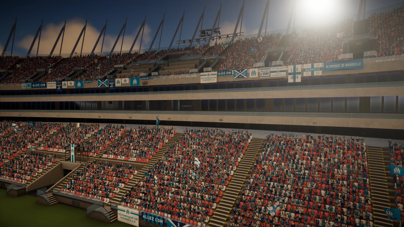 Tysiące kibiców zgromadzonych na trybunach stadionu, z widocznymi flagami i transparentami wspierającymi drużyny podczas sportowego wydarzenia.