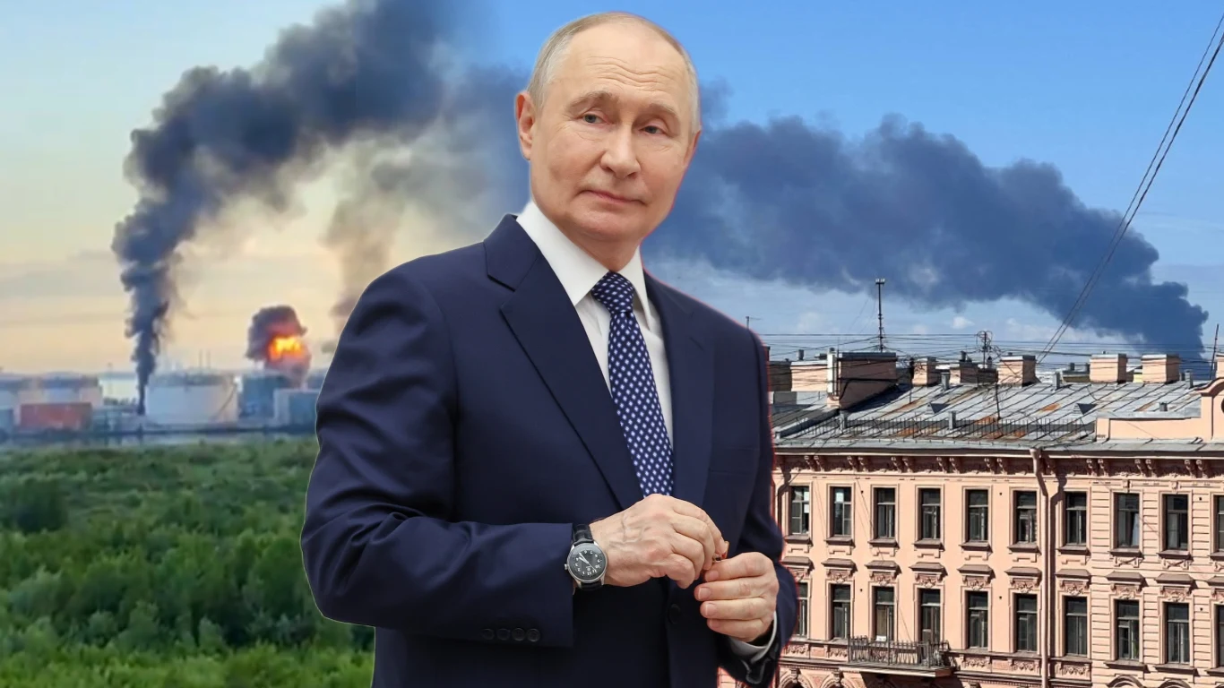 Rosja reaguje po ataku na Petersburg. Grozi "systemową odpowiedzią" Władimir Putin w garniturze na pierwszym planie, w tle gęsty dym nad płonącym kompleksem przemysłowym i kamienicą.