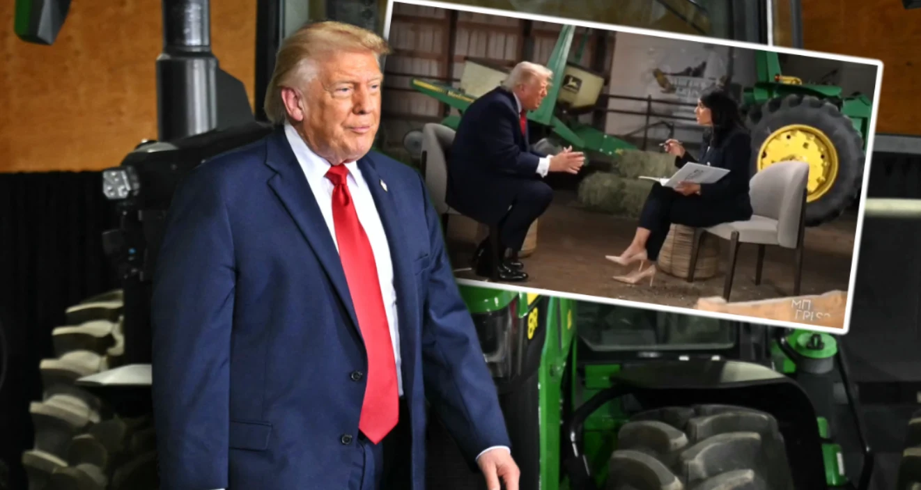 Donald Trump w garniturze i czerwonym krawacie stoi przed dużym traktorem, obok wstawka z wywiadem w hali rolniczej.