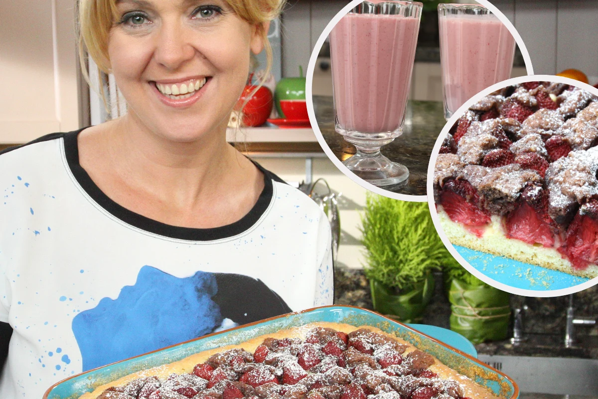 Ewa Wachowicz poleca przepisy z truskawkami Ewa Wachowicz prezentuje blaszkę ciasta z truskawkami i cukrem pudrem; w tle dwa szklanki z truskawkowym koktajlem.