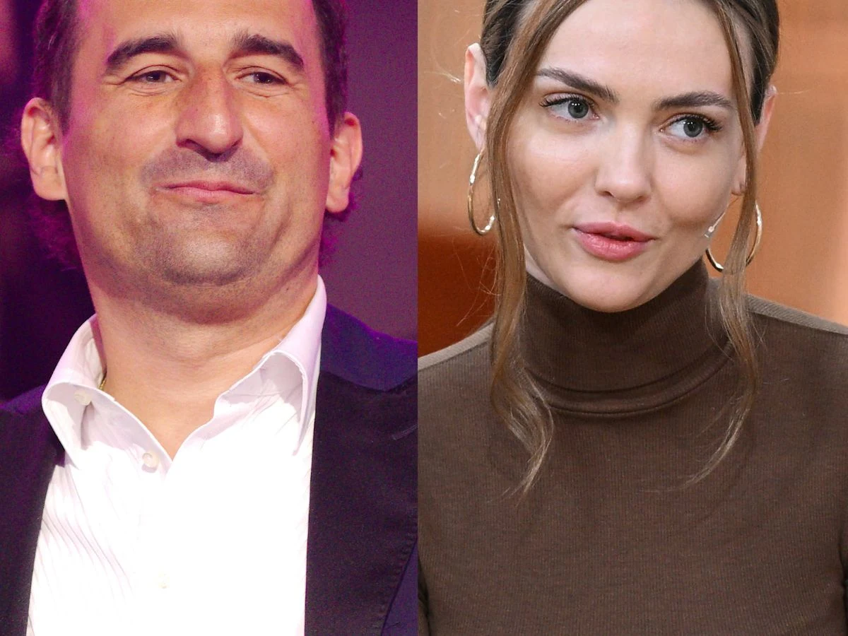 Michał Koterski i Marcela Leszczak Michał Koterski w garniturze i białą koszulą oraz Marcela Leszczak w ciemnym golfie.