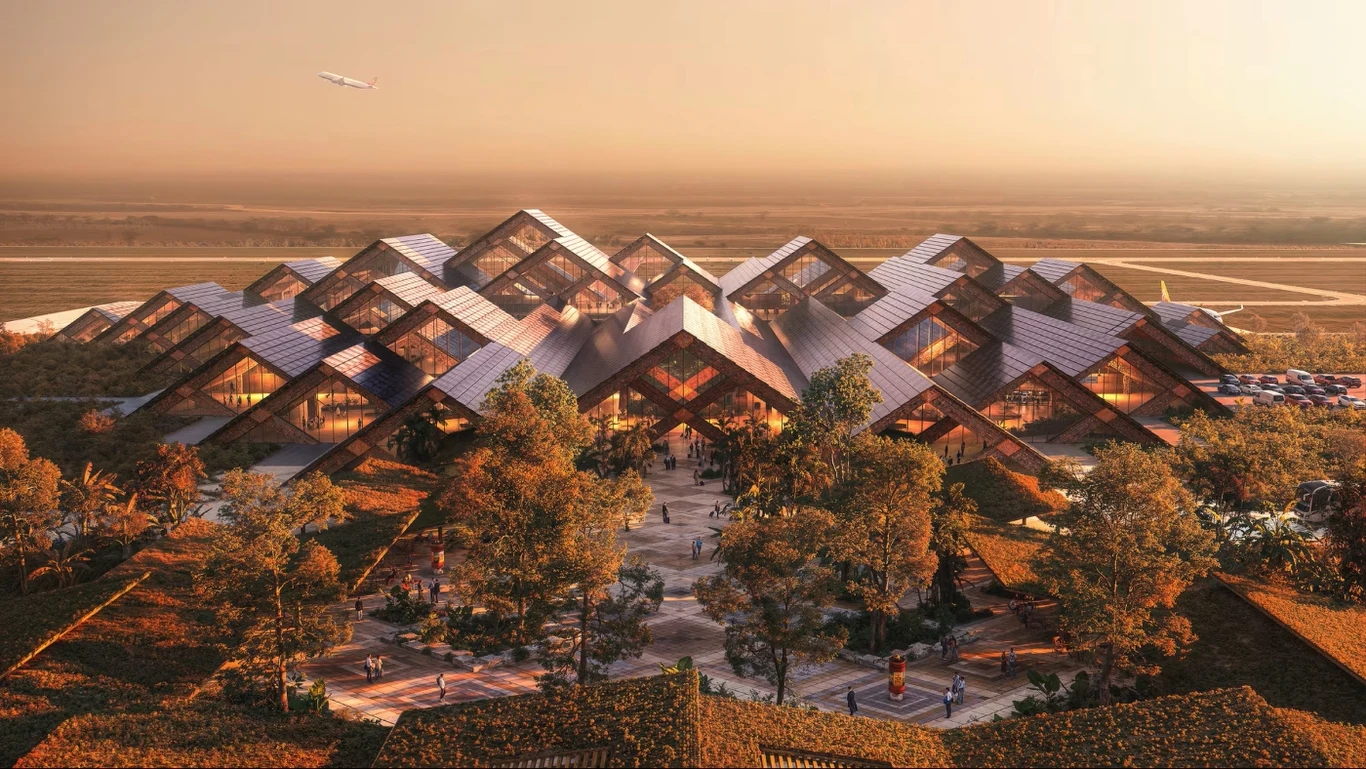 W Buthanie powstaje niezwykłe lotnisko, zaprojektowane przez Bjarke Ingels Group. Terminal Gelephu International Airport w Buthanie, dach z modułów, otoczony zielenią, z pasem i samolotem w tle.