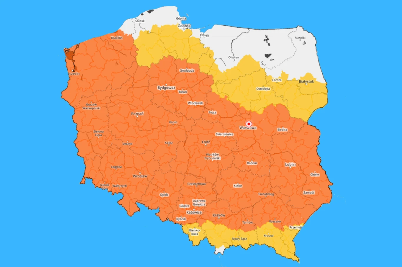 Mapa Polski z zaznaczonymi obszarami w trzech kolorach: pomarańczowym obejmującym większość kraju, żółtym występującym na północnym wschodzie, północy i południu oraz białym w części północnej, wskazując podział na różne strefy ostrzeżeń meteorologiczn...