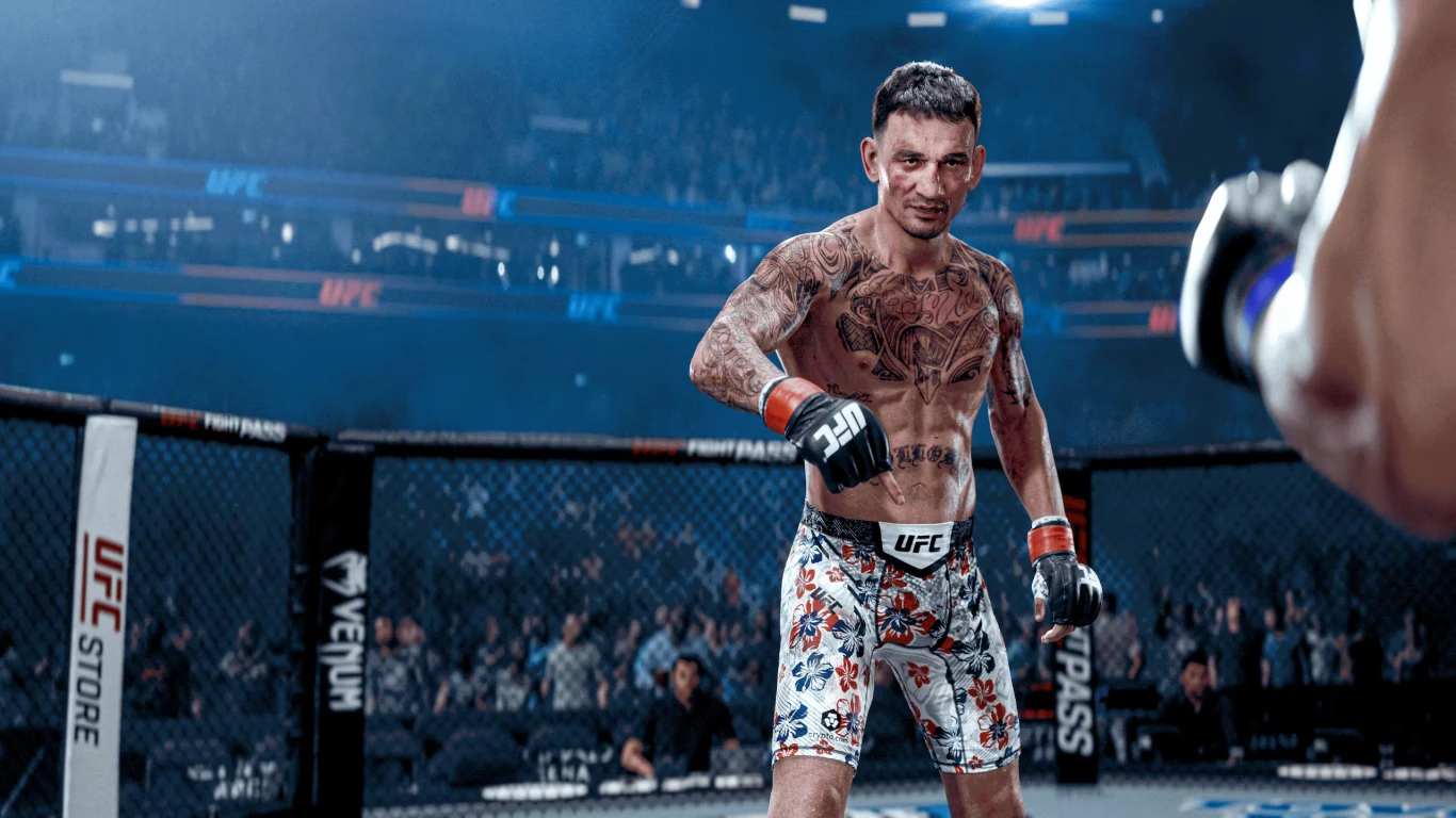 Zawodnik UFC z licznymi tatuażami w rękawicach bokserskich stoi w oktagonie, gotowy do walki z widocznym przed nim rywalem.