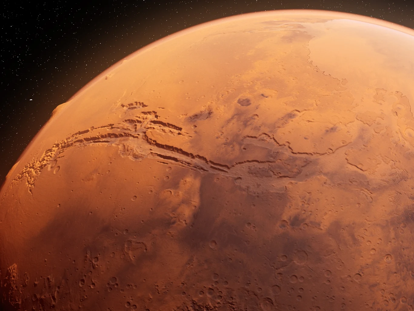 Mars nie jest zdatny do życia, ale to mogłoby się zmienić Czerwona powierzchnia Marsa z wyraźnym, rozległym kanionem Valles Marineris rozciągającym się przez środkową część planety.