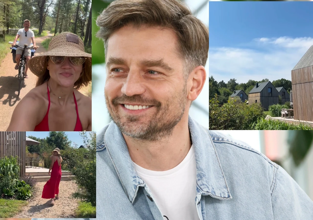 Agnieszka Kaczorowska i Marcin Rogacewicz na wakacjach w Lubiatowie Uśmiechnięty mężczyzna w jasnej kurtce jeansowej, kobieta w czerwonej sukience i słomkowym kapeluszu spacerująca po ogrodzie oraz jadąca na rowerze z mężczyzną, współczesna zabudowa domków w otoczeniu zieleni w słoneczną pogodę.