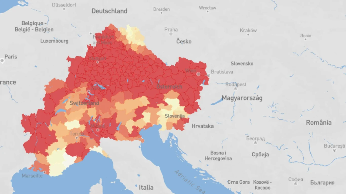 Mapa Europy Środkowej i Południowej z zaznaczonymi różnymi odcieniami czerwieni obszarami o zróżnicowanej gęstości lub intensywności, obejmująca Niemcy, Austrię, Szwajcarię, Francję, północne Włochy, Czechy, Słowację, Słowenię, zachodnią część Węgier o...